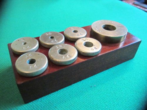 Antique brass bolt calibration set - mahogany base - dated 1897 for sale