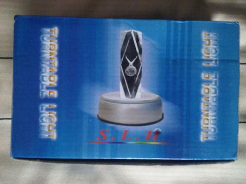 S.L.H. Display Turntable Light mirrored silver base color-changing LED