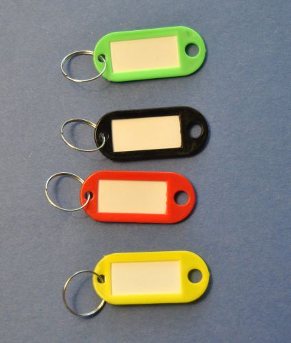 4 plastic key tags with removable labels - ships from illinois, usa for sale