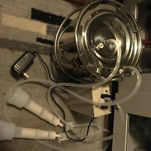 Portable milking machine for goats or cows