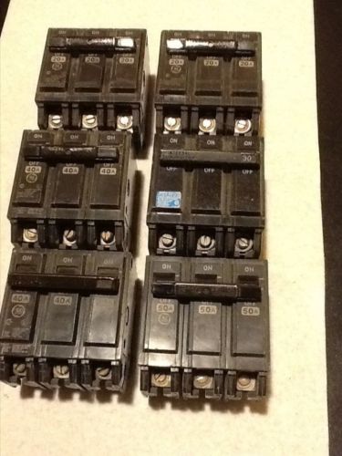 Mixed lot of 6 ge thql 3 pole circuit breakers 20, 30, 40, 50 amp plug on for sale