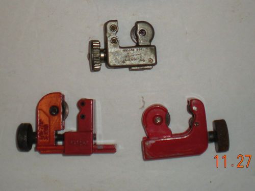 THREE USED PIPE CUTTERS