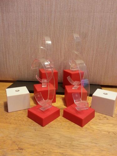 Fossil watch/bracelet display stands, red in color for sale