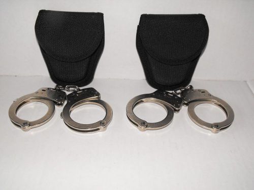 Two pair Smith and Wesson duty grade handcuffs with Bianchi nylon duty cases