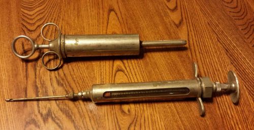 Vintage livestock syringes