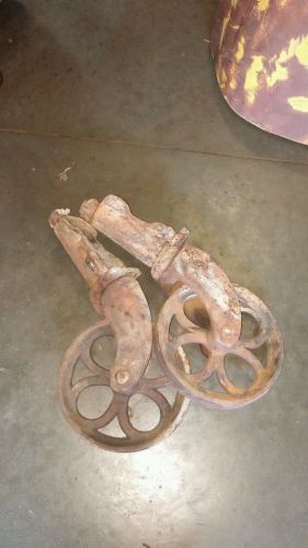 Two vintage antique industrial factory railroad cart cast iron wheels.. for sale