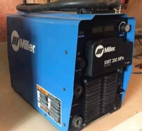 Miller welding machine 350 mpa xmt  208-575 , and wire feeder s-74 mpa plus for sale