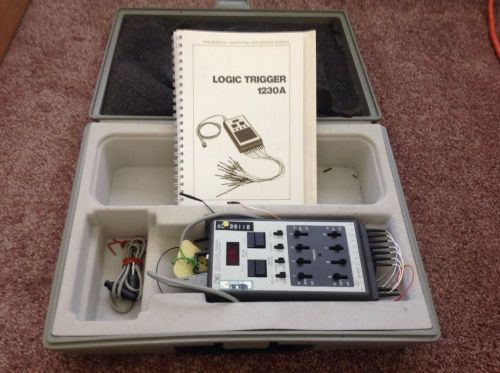 AGILENT HP 1230A LOGIC TRIGGER WITH MANUAL AND CASE USED