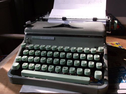 HERMES MODEL #2000 MANUEL PORTABLE TYPEWRITER WITH CARRYING CASE