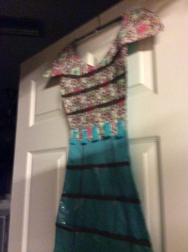 34 inch dress with 20 compartments for storing items it&#039;s on a hanger