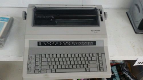 Refurbished Sharp XQ 320 Full Size Typewriter, with  paper rest,   w/warranty