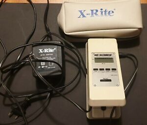 X-Rite Model 341 Densitometer with charger and pouch