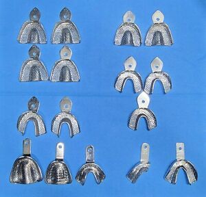 Assortment of 16 Rigid Perforated Metal Impression Trays.