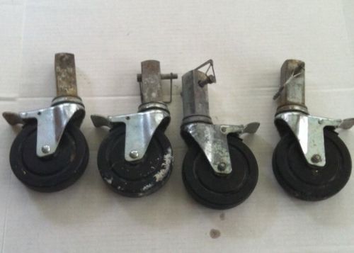 Wholesale lot of 4 metal stud with plastic black wheel   sku#xab99 for sale