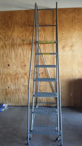 Vintage osha approved, rolling 7 step narrow isle metal warehouse ladder for sale