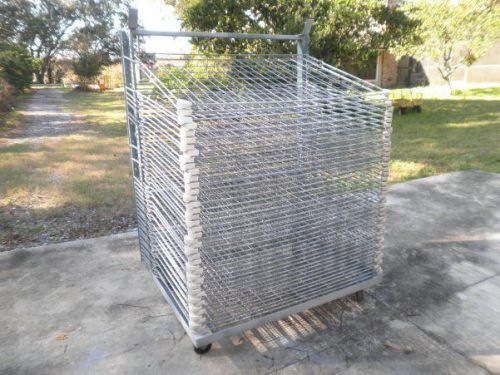 Screen printing print drying rack on wheels w/ 42 spring loaded trays / shelves for sale