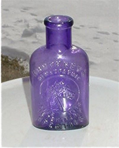 PURPLE  HUMPHREYS HOMEOPATHIC (EMBOSSED HORSE)  VETERINARY SPECIFICS BOTTLE
