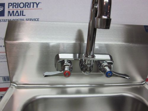 Stainless steel hand washing sink for kitchen restaurant or office setting.