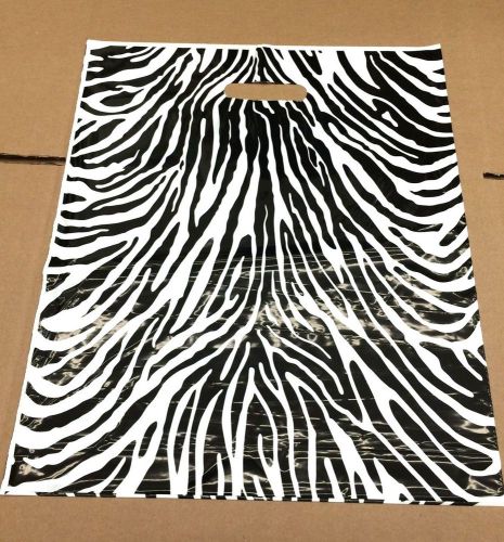 100 qty. zebra print plastic t-shirt retail shopping bags w/ handles 15 x 18 for sale