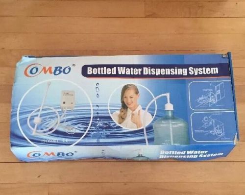 Combo com1000 bottled water dispensing system - like new +3 extra valves-new for sale