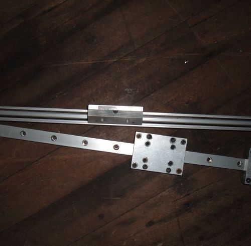 (2) 93 inch Linear Guides and ( 4) Blocks. Excellent condition!