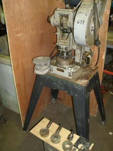 Perkins punch press with 4 dies.  #671 for sale