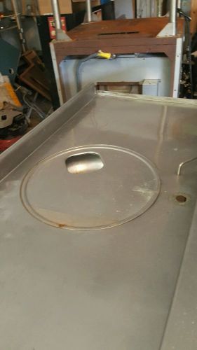 Hobart commercial garbage disposal and stainless tables