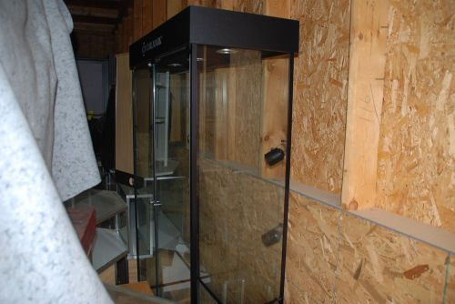 glass showcase with locking door 6 foot tall wth lights and 4 side view