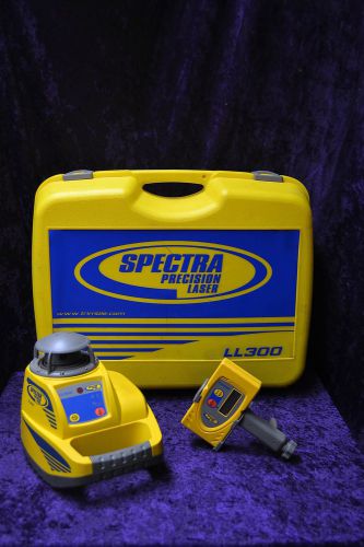 Spectra precision ll300 transit level + hr300 laser receiver with case for sale