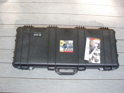 Pelican 1700 black gun or Hard instrument case with wheels open box