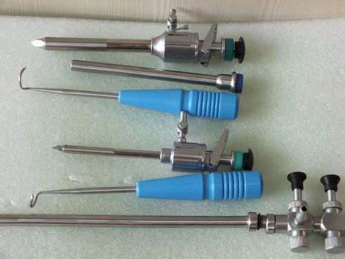 New laparoscopy suction tube 2- mochi 5mm 1- trocar 10mm 1- trocar 1- reducer for sale