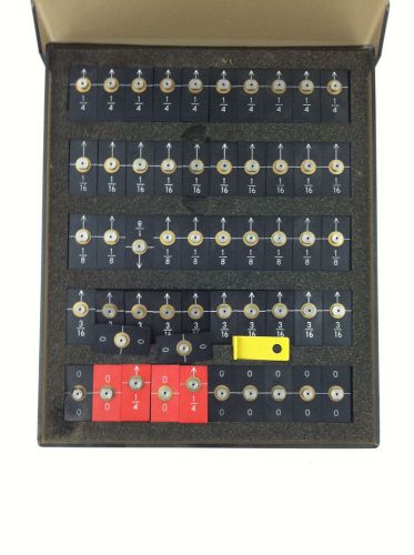 STOESSER REGISTER SYSTEMS: box of various register pins with base