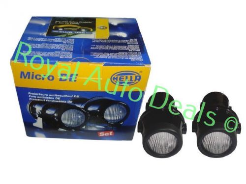 New brand pair of genuine hella micro de fog lamps inc fitting kit for sale