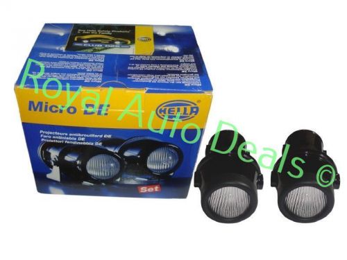 New Brand Pair Of Genuine Hella Micro DE Fog Lamps Inc Fitting Kit