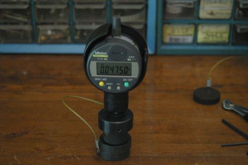 MITUTOYO ABSOLUTE 543-252B ID-C112EB, .5-.00005 (12.7-0.00mm) with gage holder