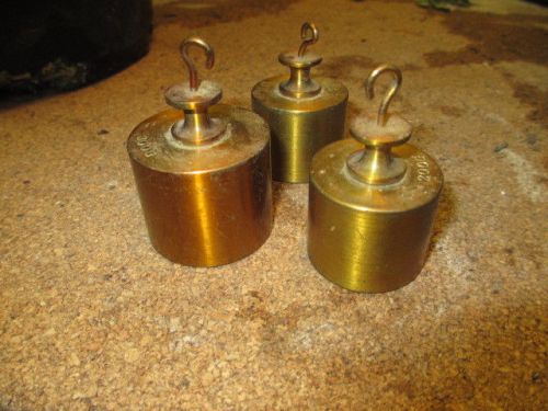 lot of (3) brass hooked weights
