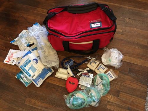 La rescue emt ems trauma bag with supplies: stethoscope, c-collar, shears, cpr p for sale