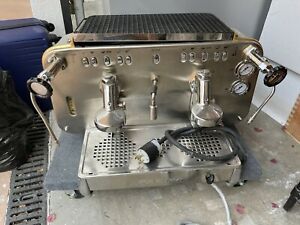 used commercial espresso machine Faema E61 Jubil two group. Sold As-Is.