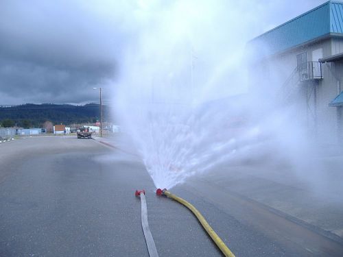 Fire fighting water curtain