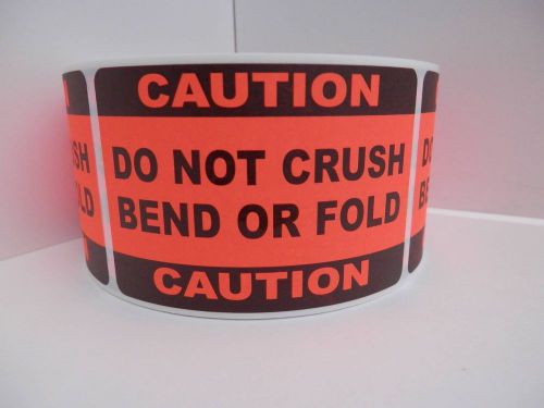 50 CAUTION DO NOT CRUSH BEND OR FOLD 2x3 sticker label red flourescent bkgd