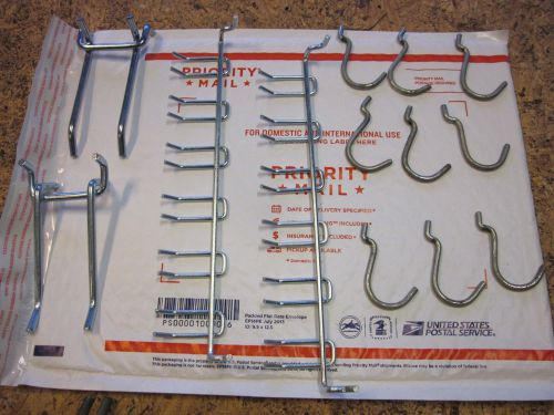 Lot of 70 various size used peg board hooks. Pictures are of actual items.