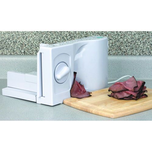Compact adjustable food slicer cuts thicknesses from 1/16&#034; to 1/2&#034;
