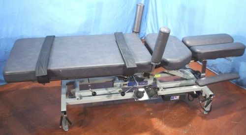 Leander power chiropractic table with warranty!! for sale