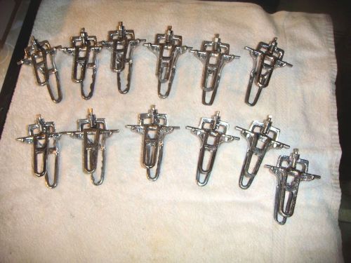 Our lot #6 of 12  spring type small articulators - chrome - 12 keystone for sale