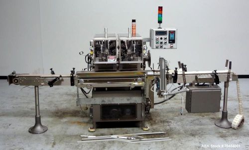 Used- Lakso Model 300 / 450 Automatic Twin Head Cottoner. Machine is capable of