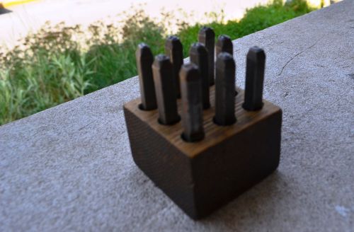Reclaimed Vintage Number Punches in Wood block.  Nice!