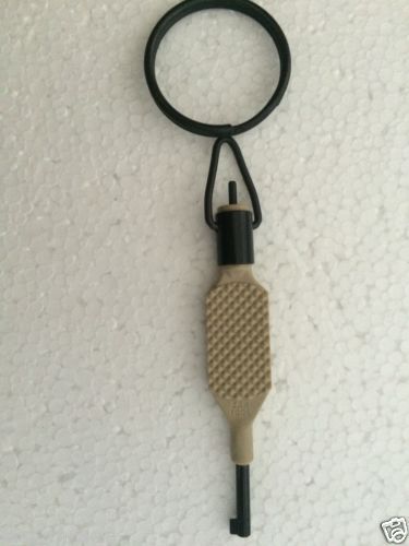 Zak tool zt9p polymer tan knurled swivel handcuff key with lifetime warranty for sale