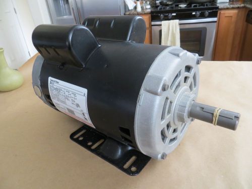 Ao smith 2 hp motor - brand new in box. reversible. capacitor start. 10 amps*** for sale