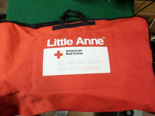 LAERDAL LITTLE ANNE CPR TRAINING MANIKIN ---- loads of extra supplies included