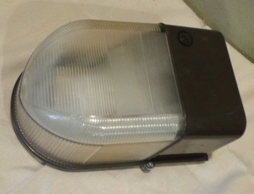 Vtg Commercial Lighted wall mount by Lithonia lighting dusk to dawn light curved